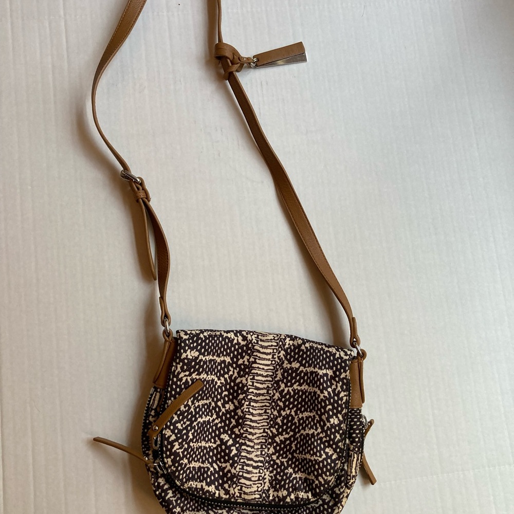 Women’s Vince Camuto snake crossover handbag.